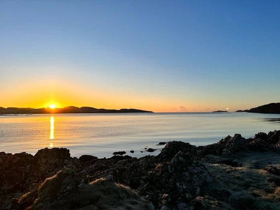 The sun setting on Carrick beach