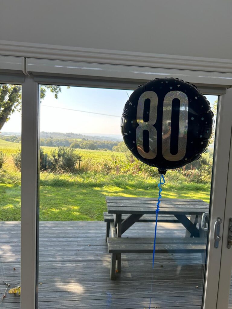 80th party balloon in the seascape